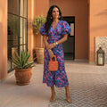 Vestido Valentina violeta azul escote V mangas abullonadas – Cloe Paris